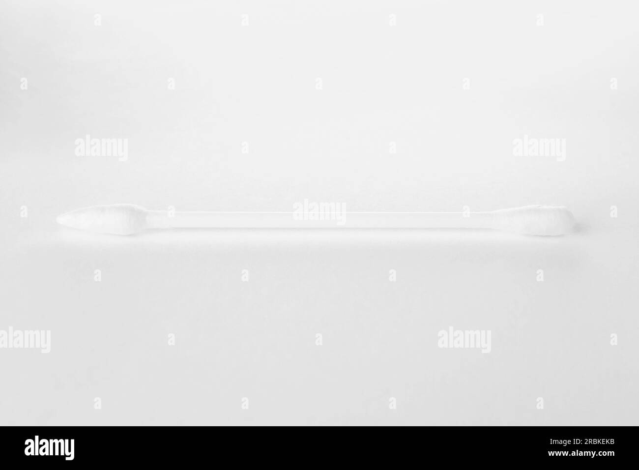 One clean cotton bud isolated on white Stock Photo Alamy