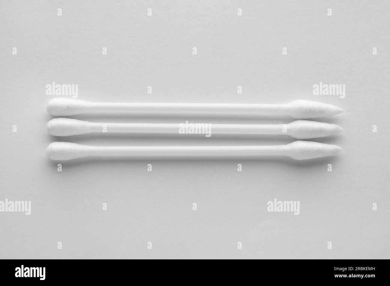 Clean cotton buds isolated on white, top view Stock Photo Alamy