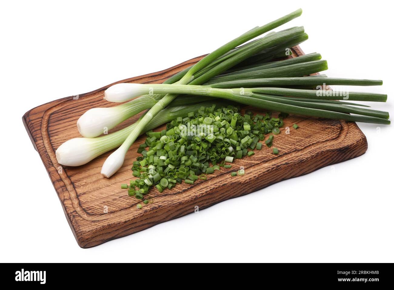 Whole and chopped green onion isolated on white Stock Photo - Alamy