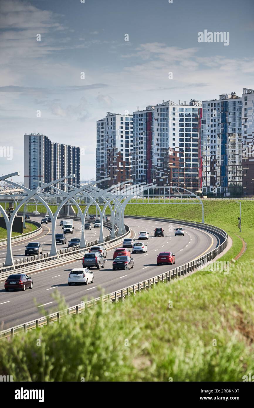 Russia, St.Petersburg, 07 July 2023: Expressway of the western high-speed diameter in clear sunny weather, green lawns along the road, new colourful Stock Photo