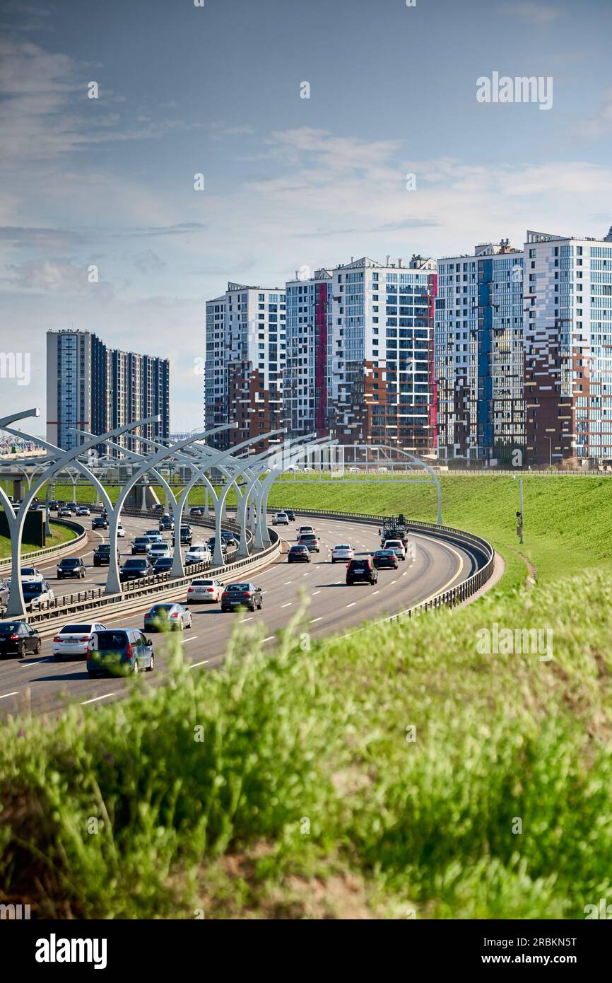 Russia, St.Petersburg, 07 July 2023: Expressway of the western high-speed diameter in clear sunny weather, green lawns along the road, new colourful Stock Photo