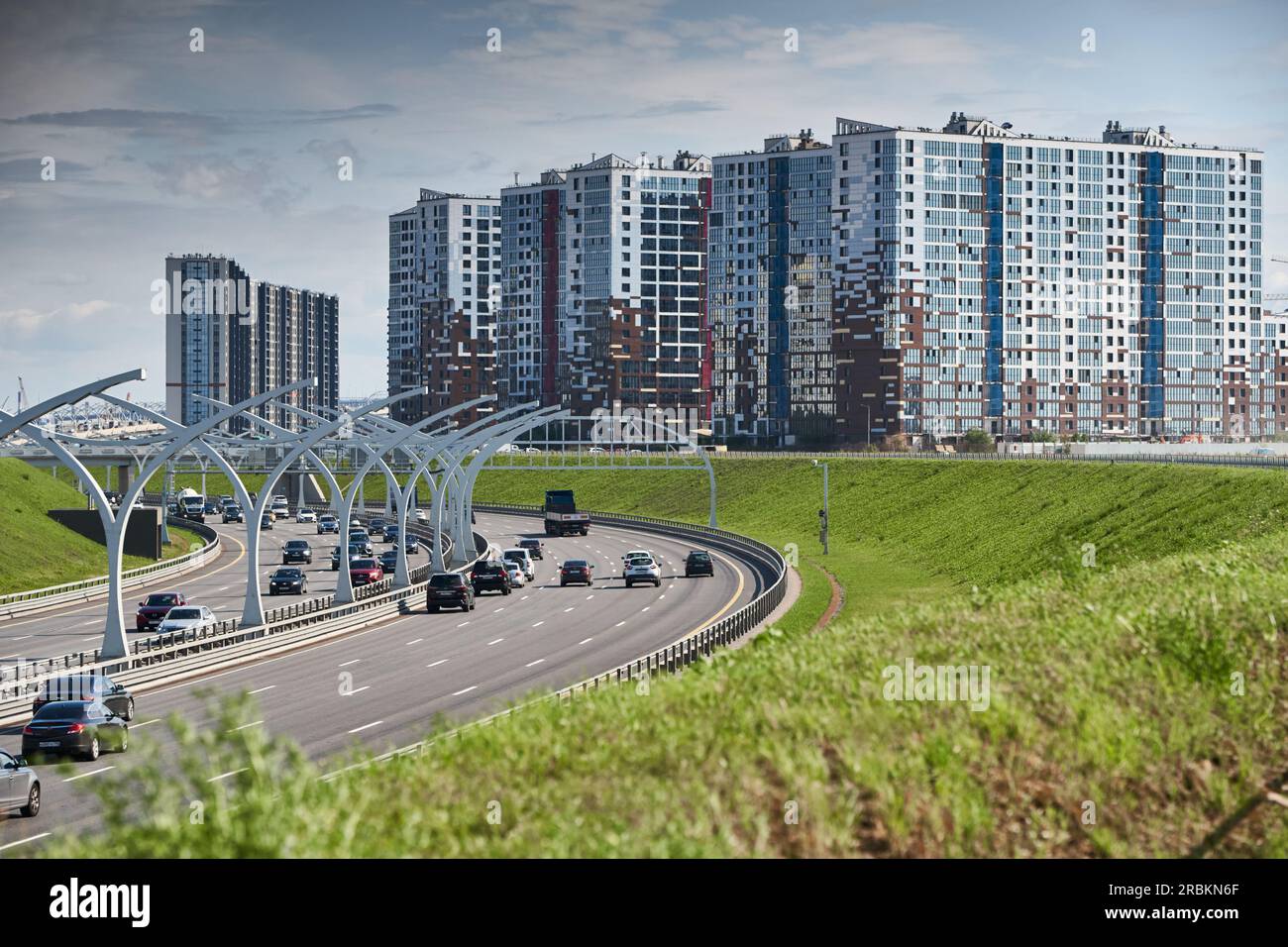 Russia, St.Petersburg, 07 July 2023: Expressway of the western high-speed diameter in clear sunny weather, green lawns along the road, new colourful Stock Photo