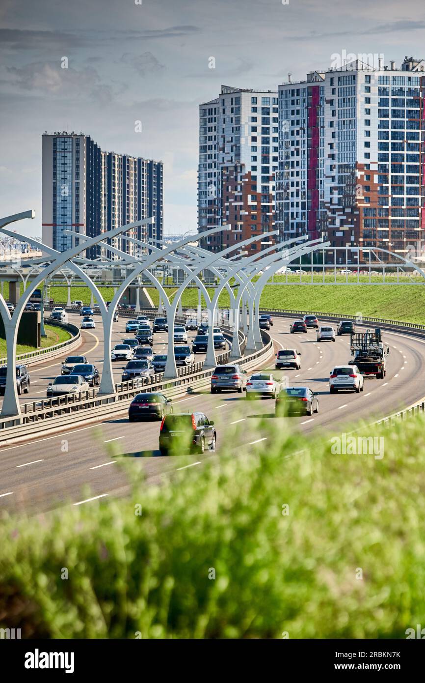 Russia, St.Petersburg, 07 July 2023: Expressway of the western high-speed diameter in clear sunny weather, green lawns along the road, new colourful Stock Photo