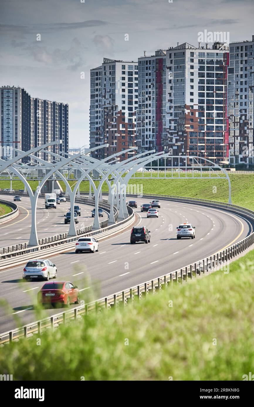 Russia, St.Petersburg, 07 July 2023: Expressway of the western high-speed diameter in clear sunny weather, green lawns along the road, new colourful Stock Photo