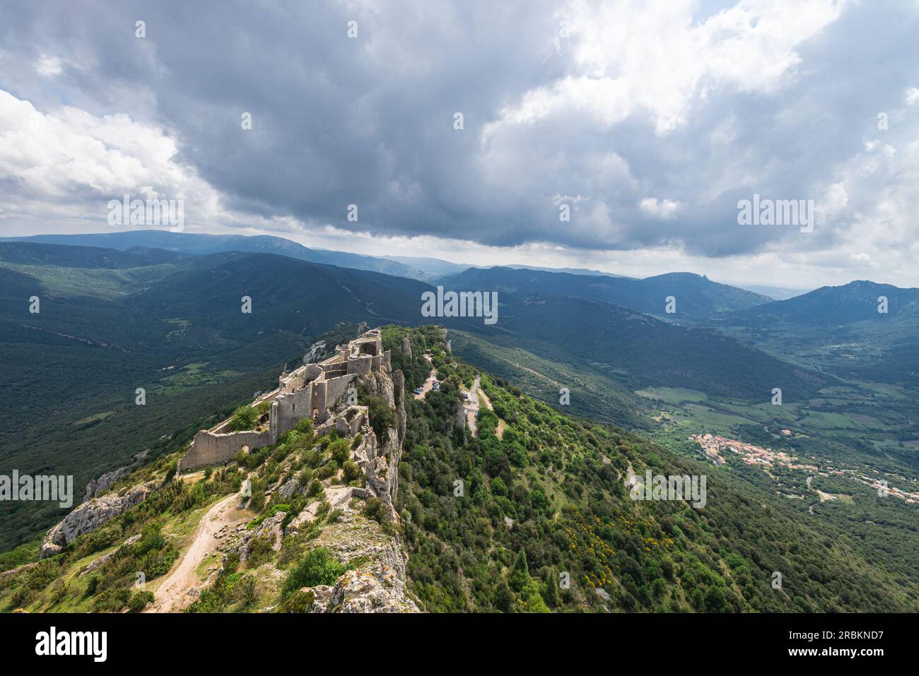Peyrepertuse (Languedocien: Castèl de Pèirapertusa) is a ruined fortress and one of the so-called Cathar castles located high in the French Pyrénées. Stock Photo