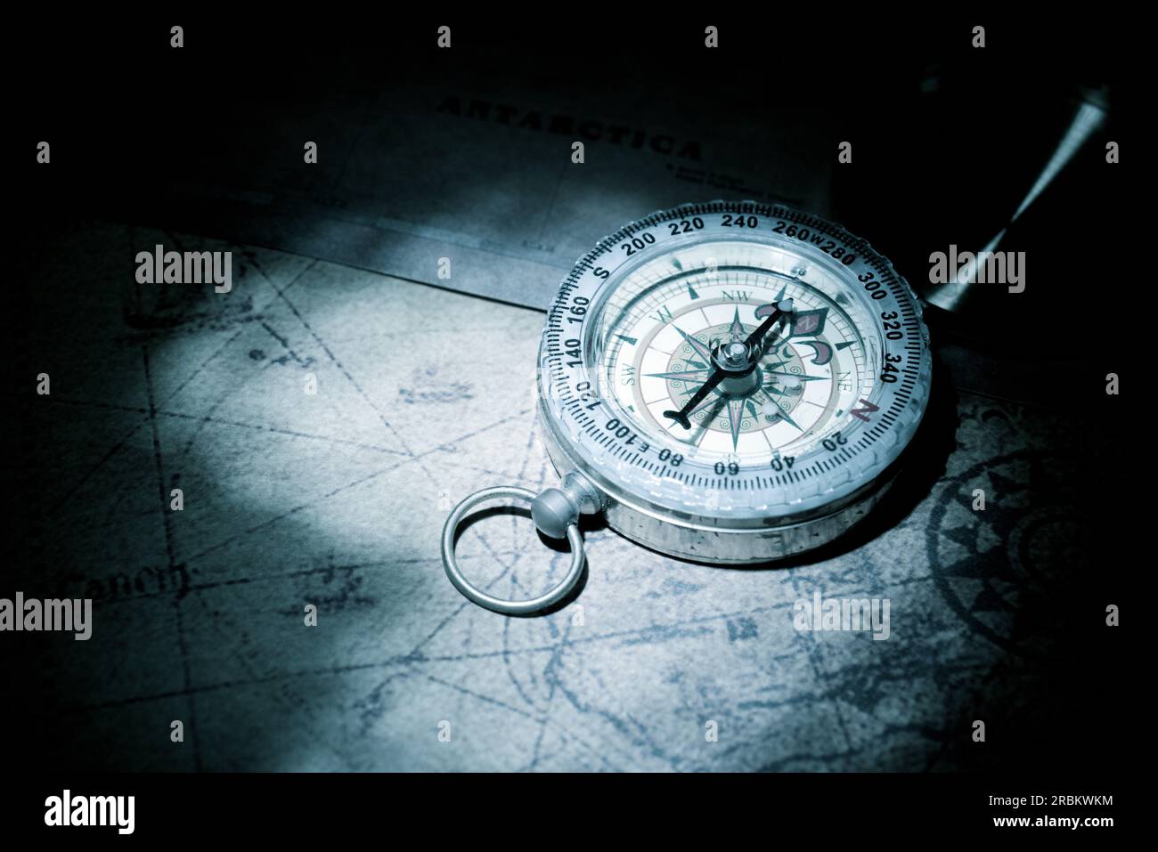 Close-up of a vintage compass on an antique paper map Stock Photo - Alamy