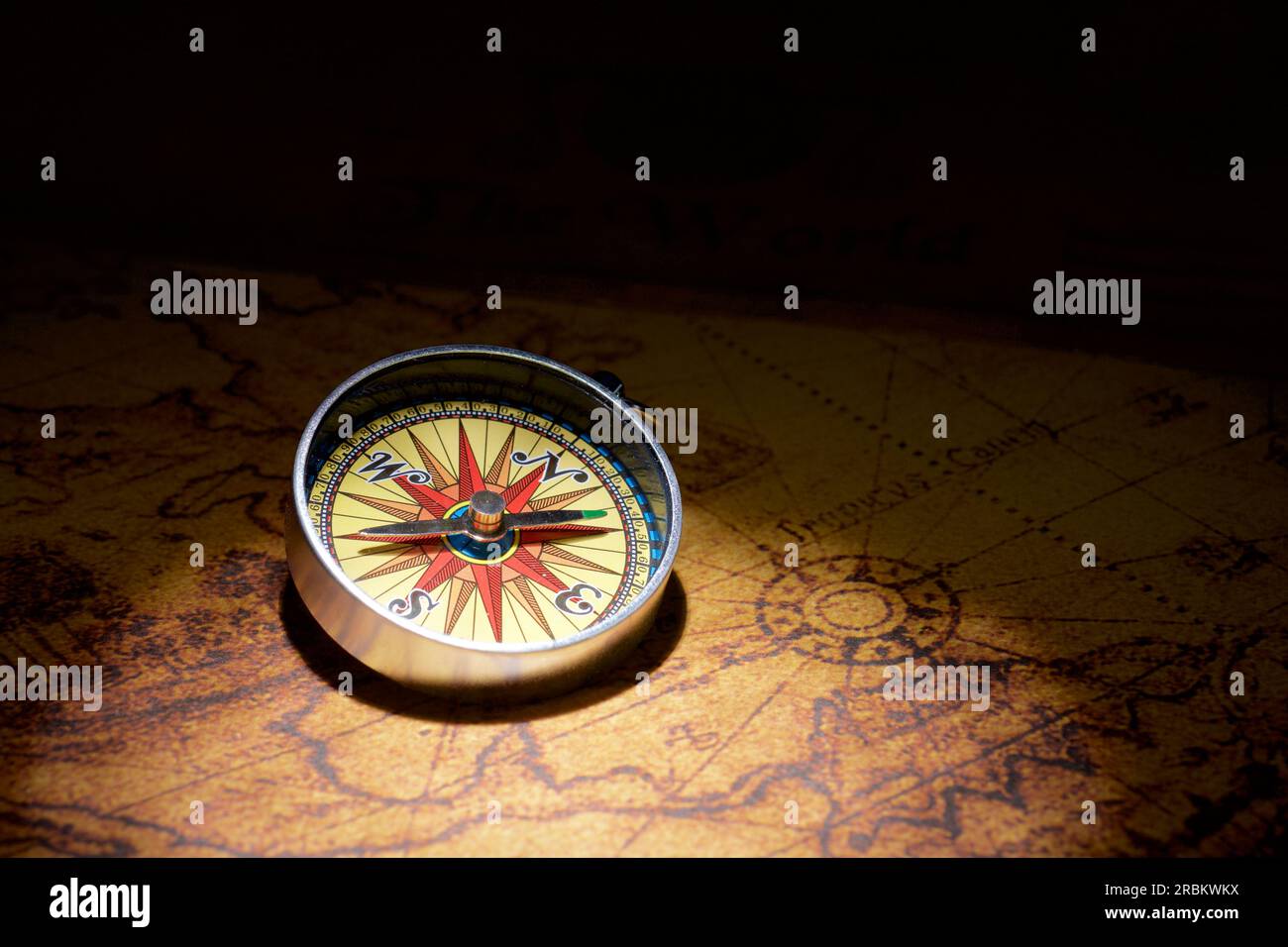 Close-up of a vintage compass on an antique paper map Stock Photo - Alamy