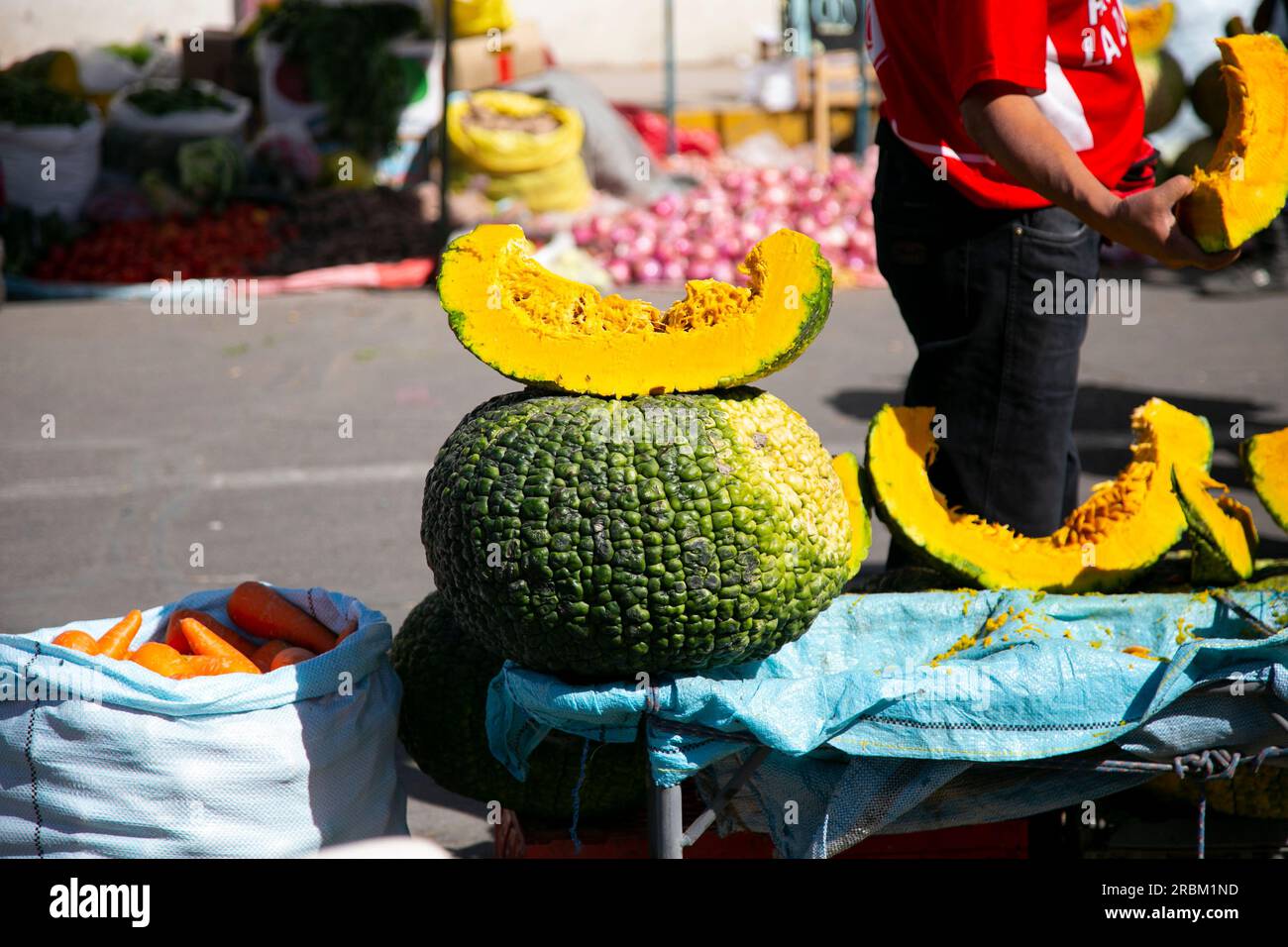 Zapallo in a street food market in Arequipa. The pumpkin macre or zapallo is a vegetable native to South America with greater presence in Peru. Stock Photo