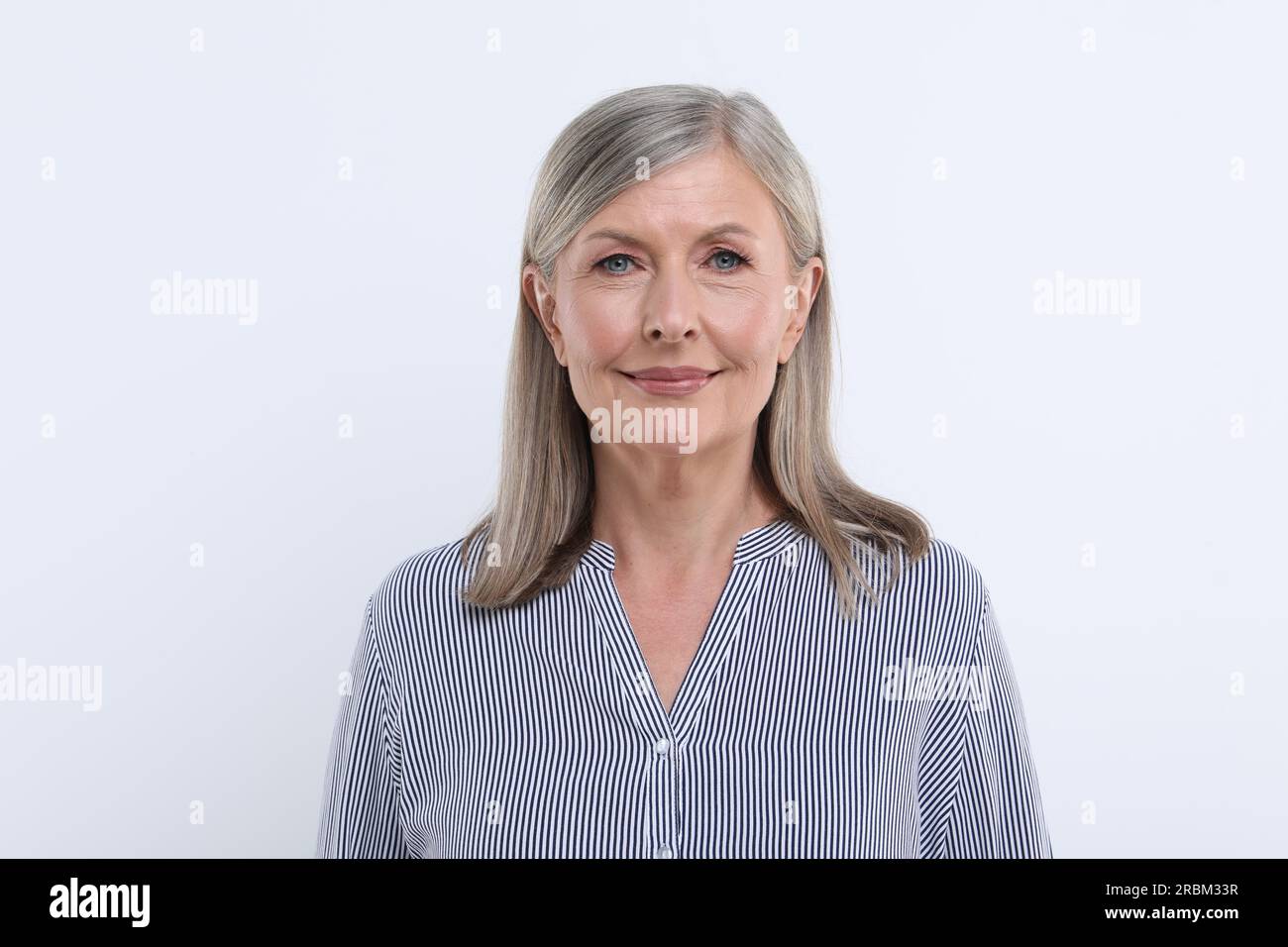 Portrait of beautiful senior woman on white background Stock Photo - Alamy