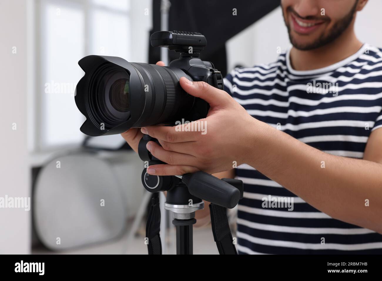 Professional camera shooting biracial hi-res stock photography and ...