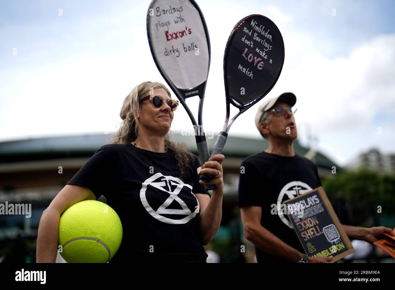 Extinction Rebellion protesters outside of Wimbledon on day eight of