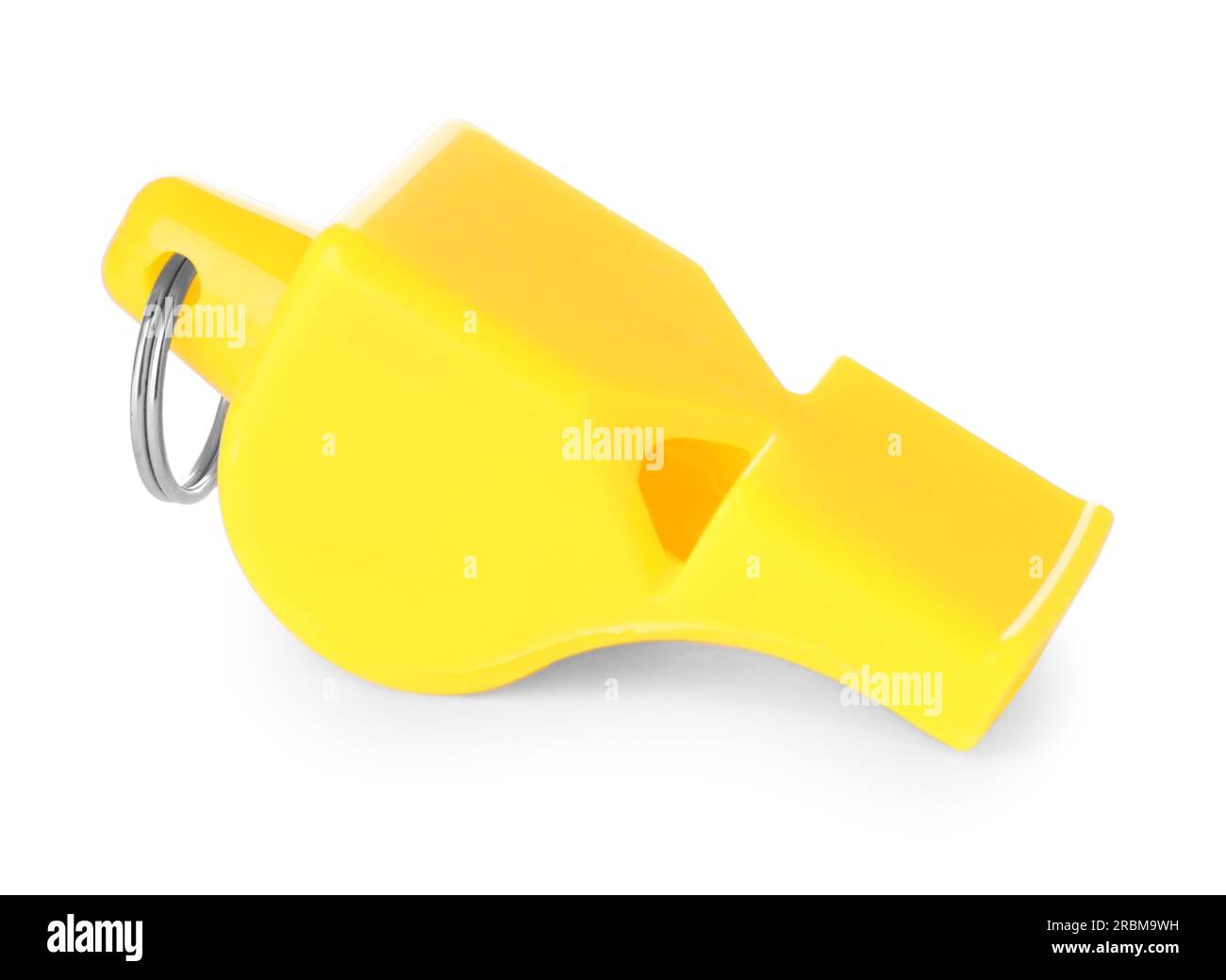 One yellow plastic whistle isolated on white Stock Photo Alamy