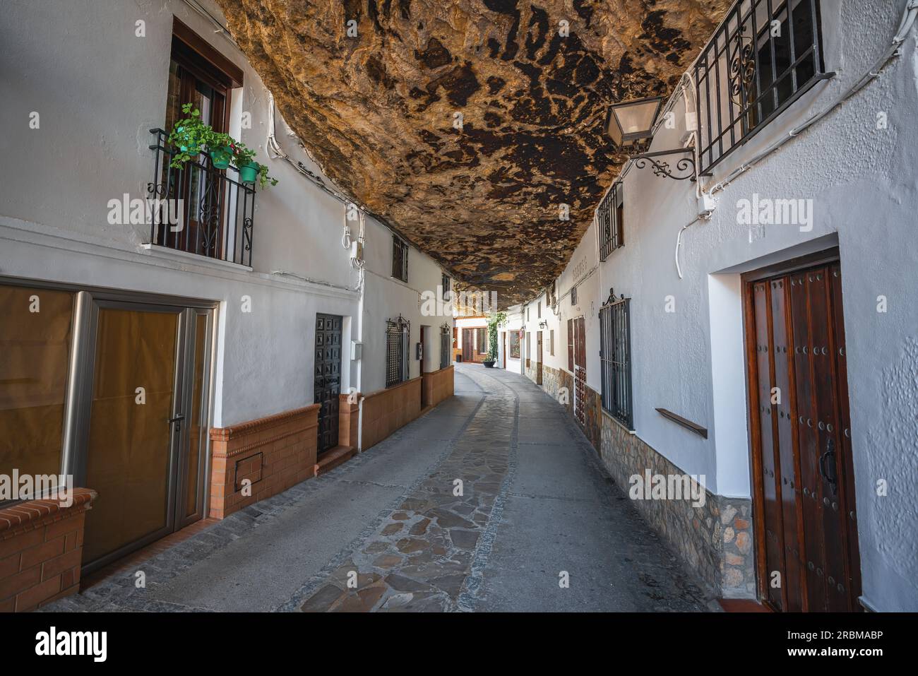 Calle Cuevas de la Sombra Street - Setenil de las Bodegas, Andalusia, Spain Stock Photo