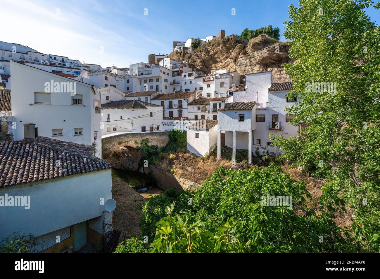 White Houses, Rock Overhangs and Trejo River - Setenil de las Bodegas, Andalusia, Spain Stock Photo