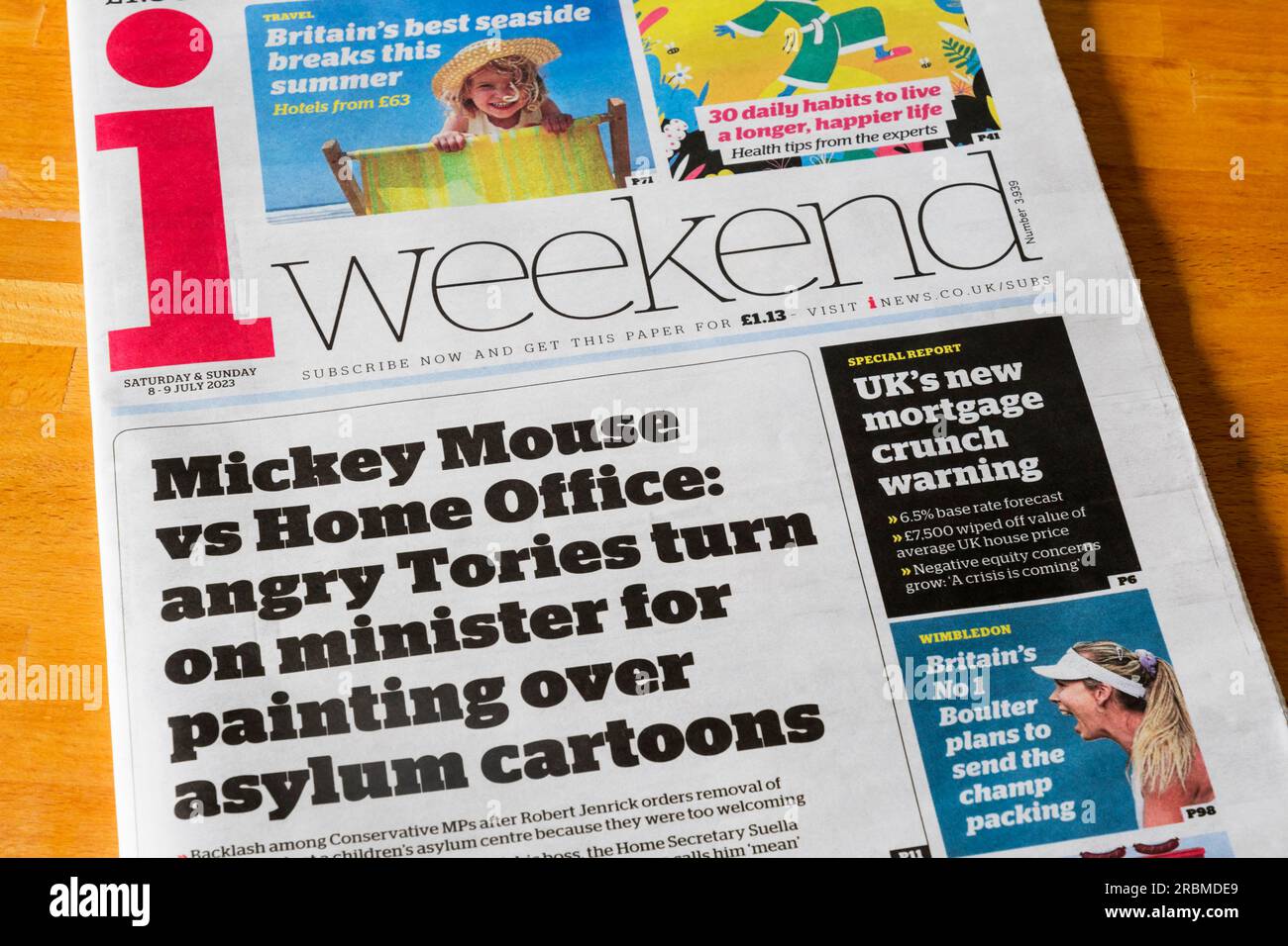 8 July 2023. Headline on front page of i newspaper reads Mickey Mouse vs Home Office: angry Tories turn on minister for painting over asylum cartoons. Stock Photo