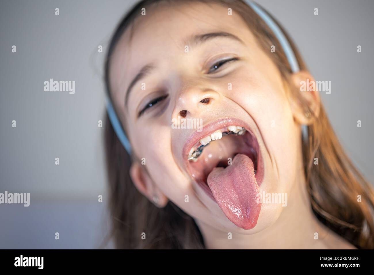 A Child Girl Open Her Mouth And Show Her Tounge Stock Photo Alamy A Child Girl Open Her Mouth And Show Her Tounge Stock Photo Alamy