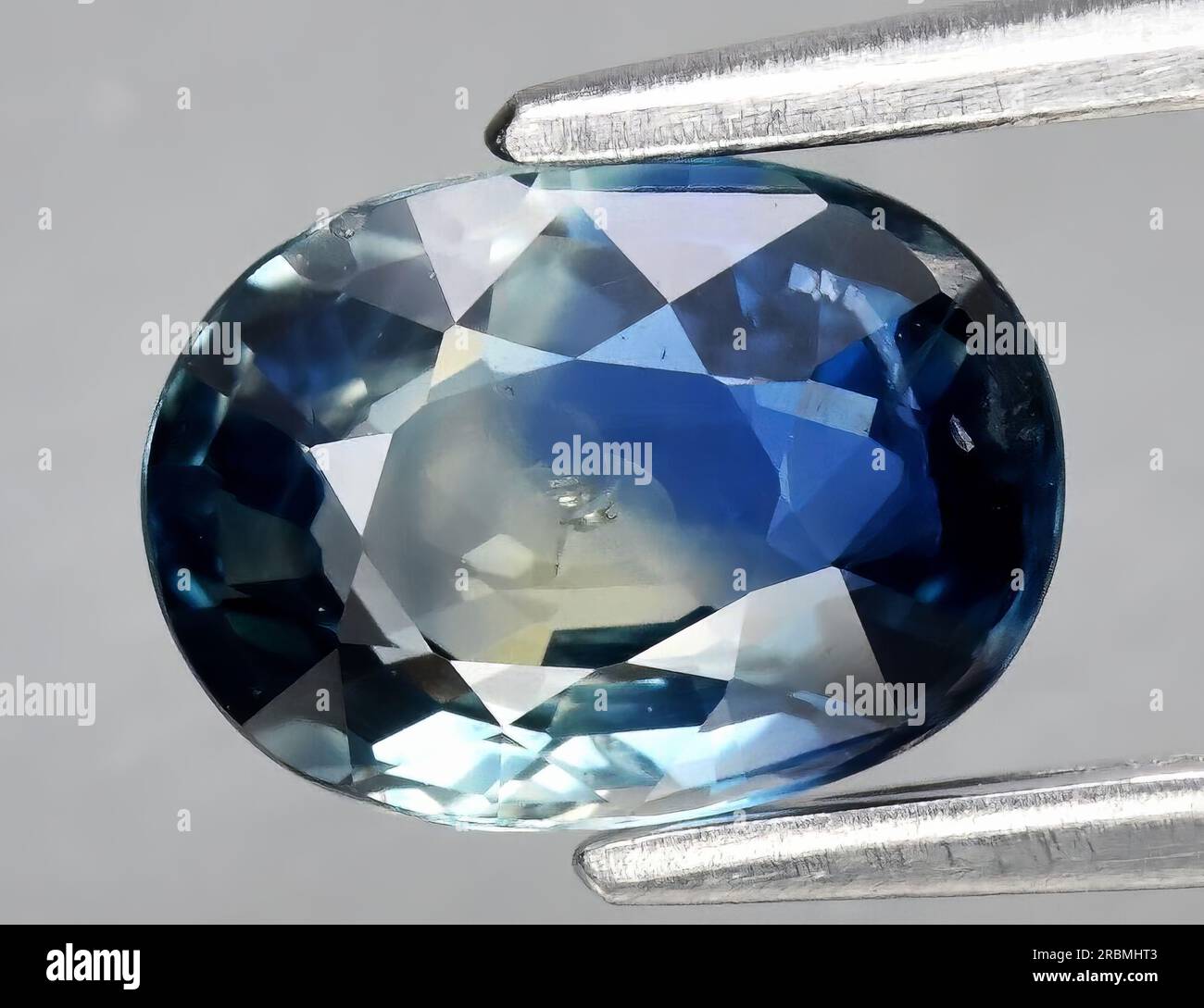 Natural gemstone green blue sapphire on white background Stock Photo ...