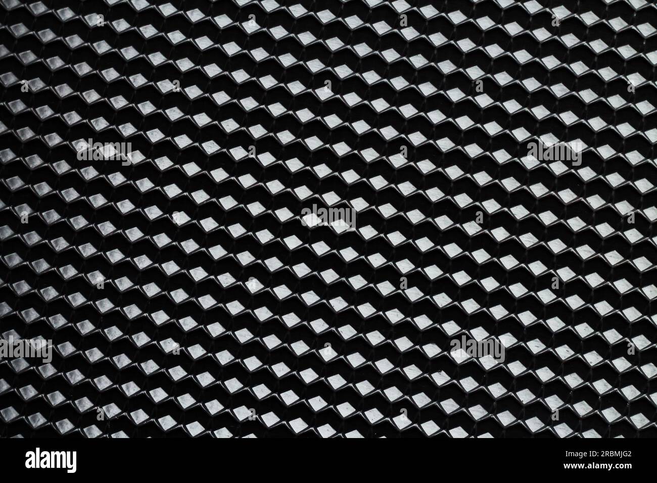 Black color abstract trellised cellular background Stock Photo