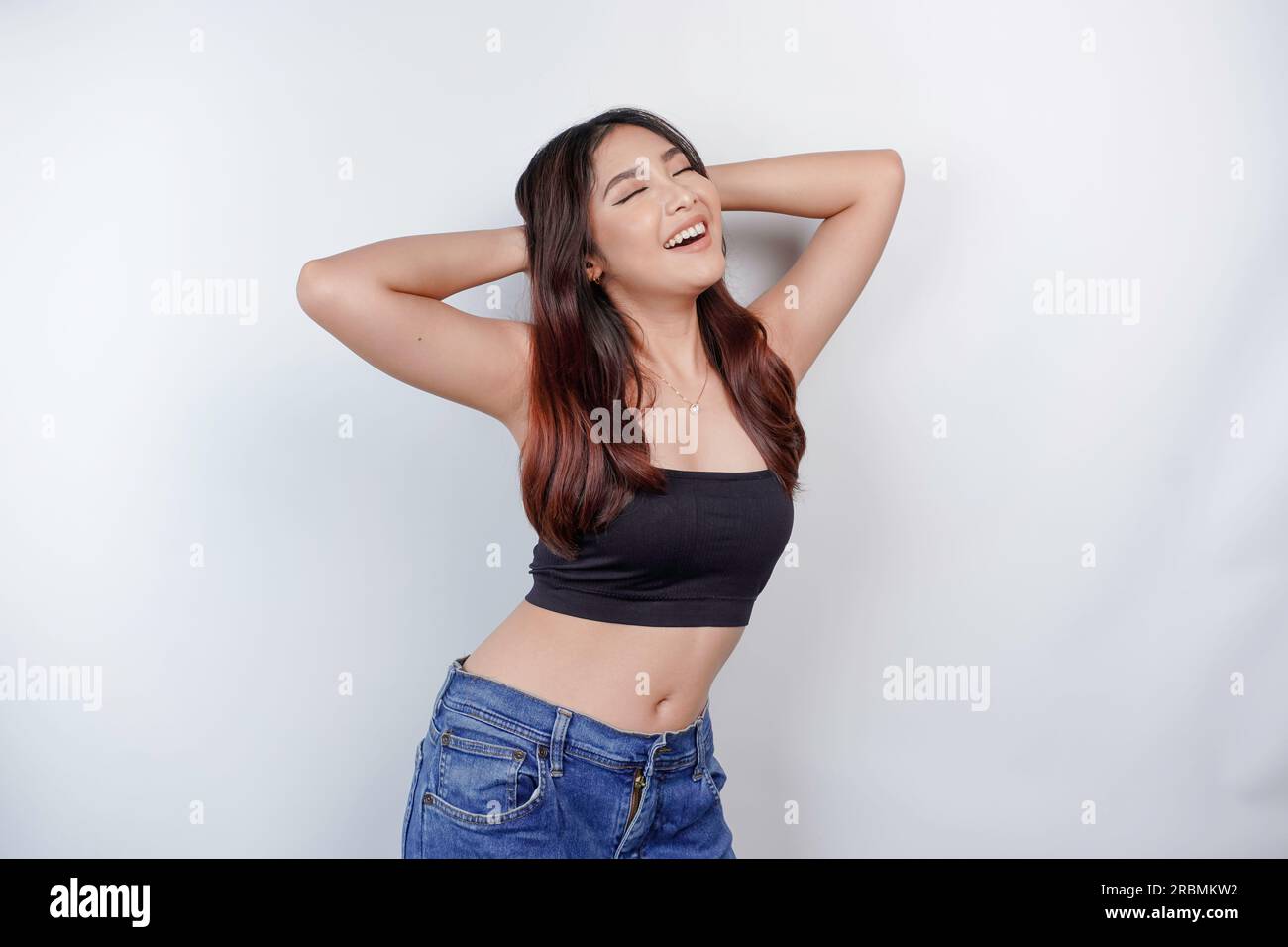 Young girl wearing crop top hi-res stock photography and images