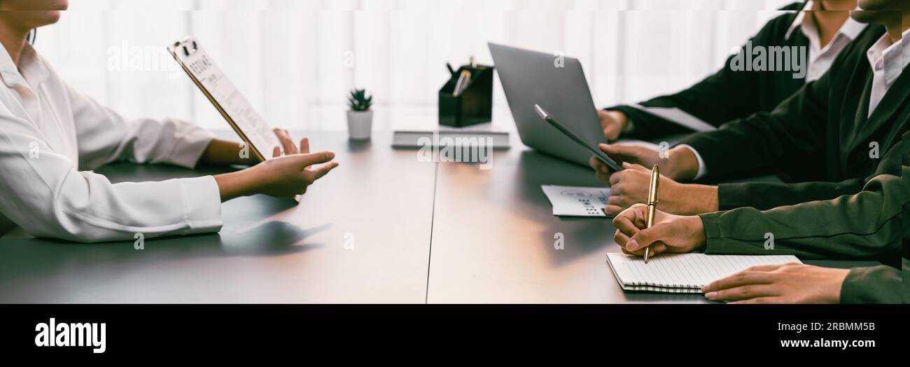 Candidate and interviewers discuss work experience and qualifications