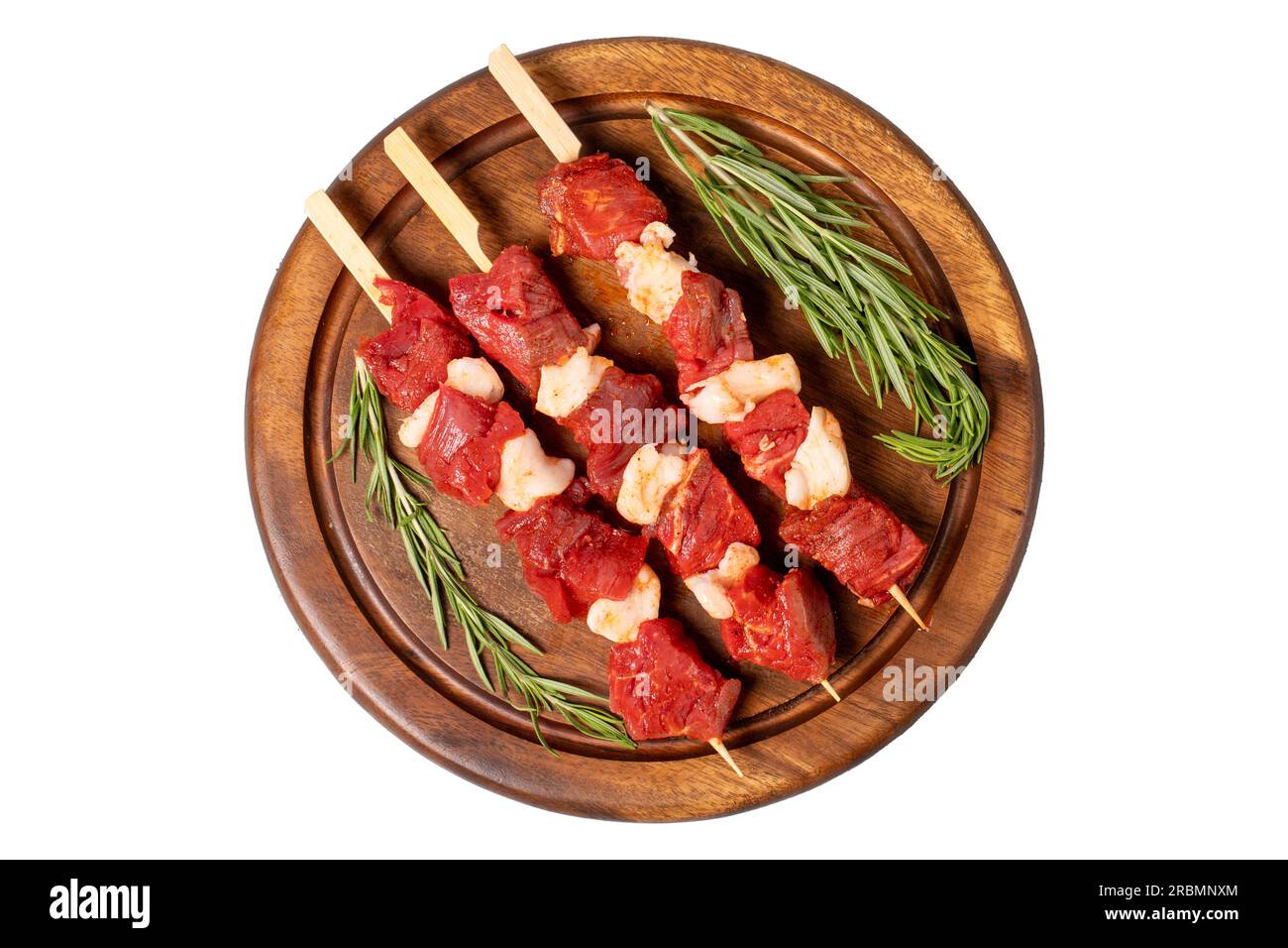 Beef cubed skewer. Raw shish kebab isolated on white background