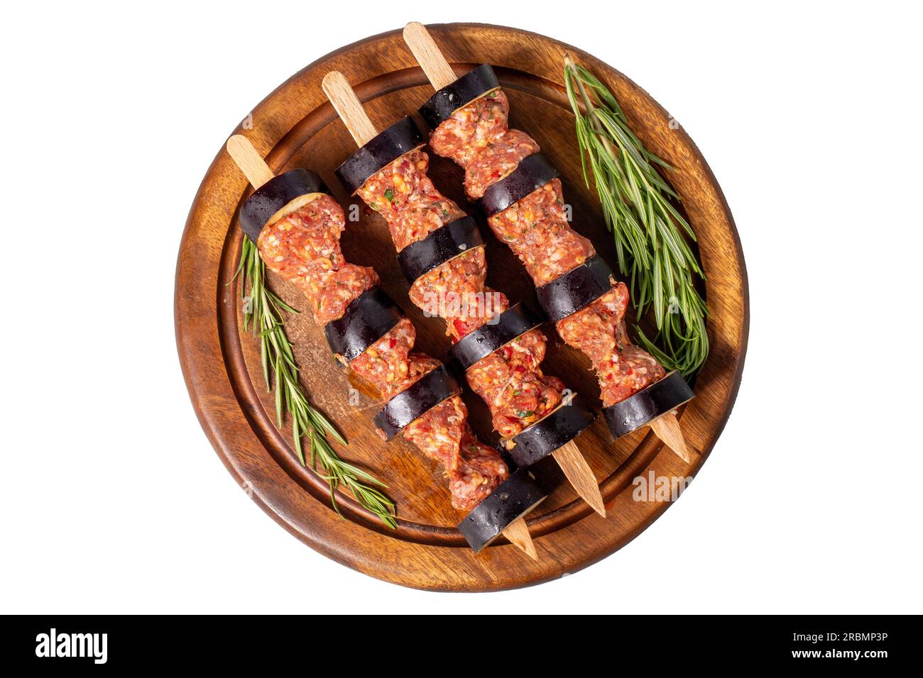 Eggplant kebab. Eggplant shish kebab with raw minced meat isolated on