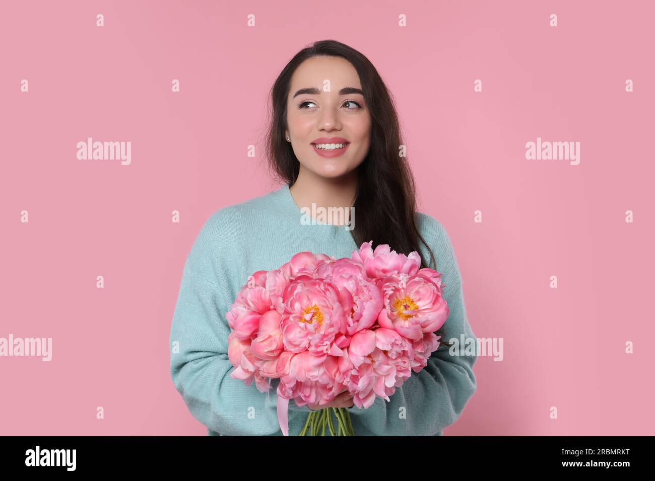 Woman with bouquet of peonies hi-res stock photography and images - Alamy