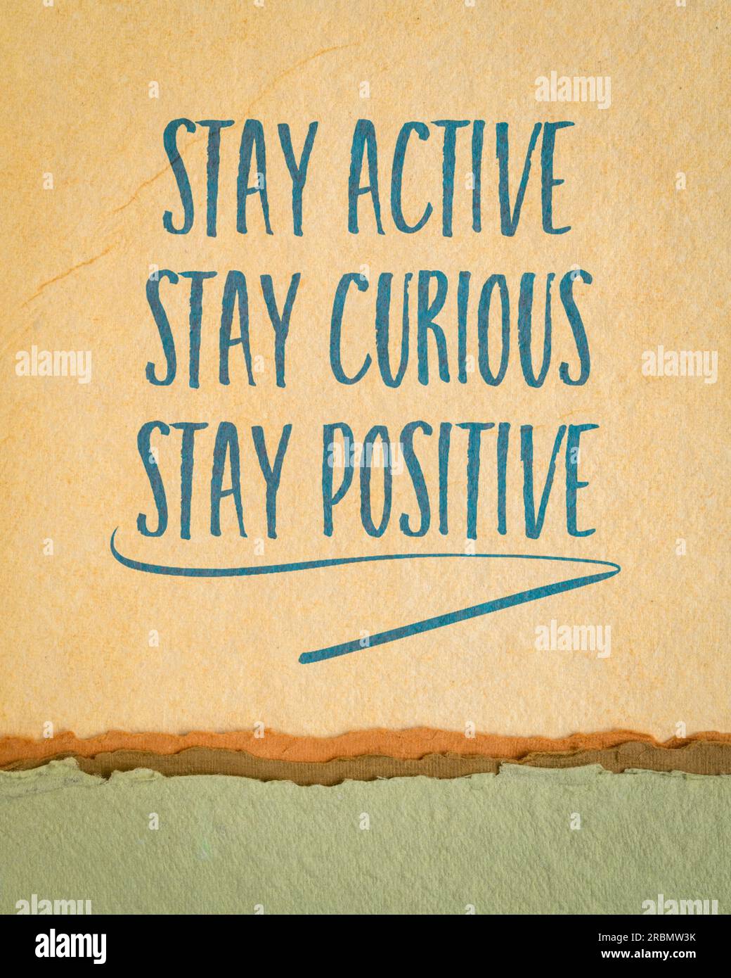 stay active, curious and positive - the keys to healthy aging, inspirational note on an art paper Stock Photo