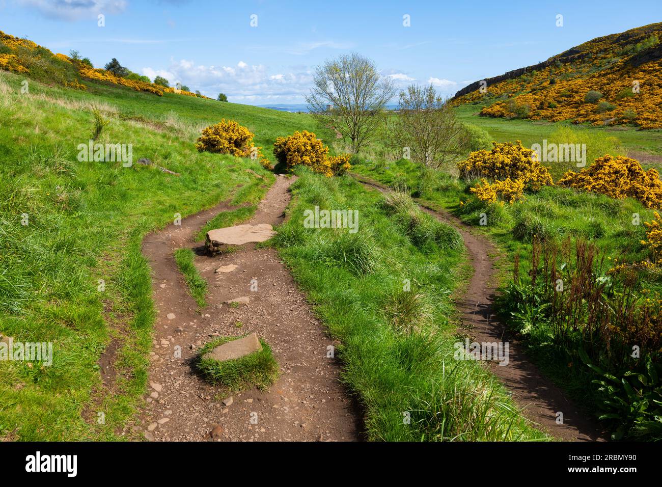 Springtime landscape with hiking trail in the Holyrood Park in Edinburgh, Scotland, UK Stock