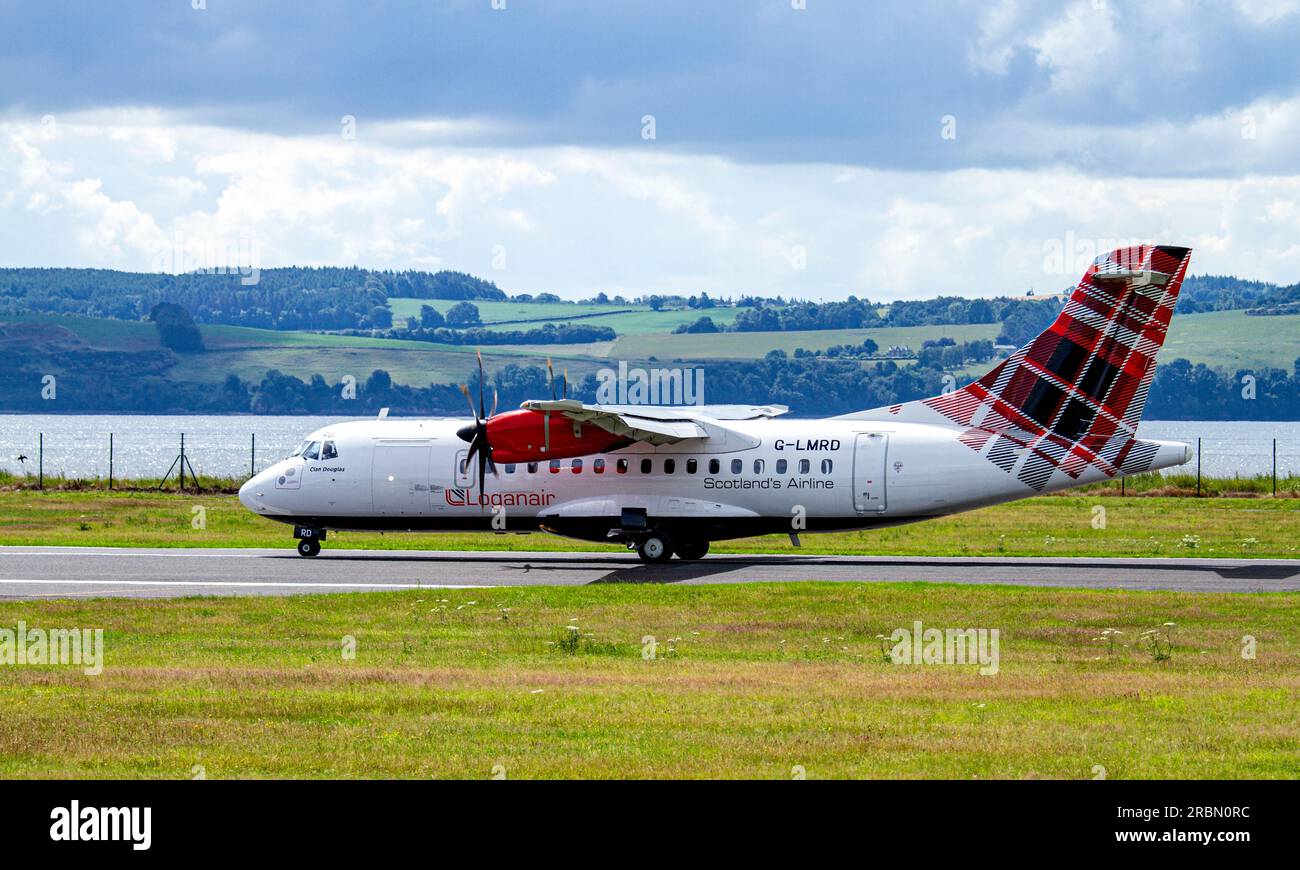 Dundee, Tayside, Scotland, UK. 10th July, 2023. The weather across Tayside, Scotland is bright and warm with temperatures reaching 22°C. Loganair G-LMRD aircraft from London Heathrow arrived on time at 11.30 a.m. The SAAB Loganair twin-prop plane landing at the Dundee Riverside Airport. Credit: Dundee Photographics/Alamy Live News Stock Photo