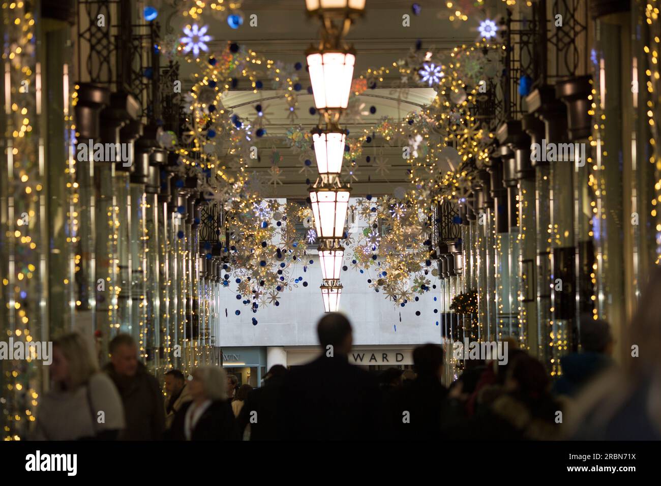 Shoppers walk in central London Stock Photo Alamy