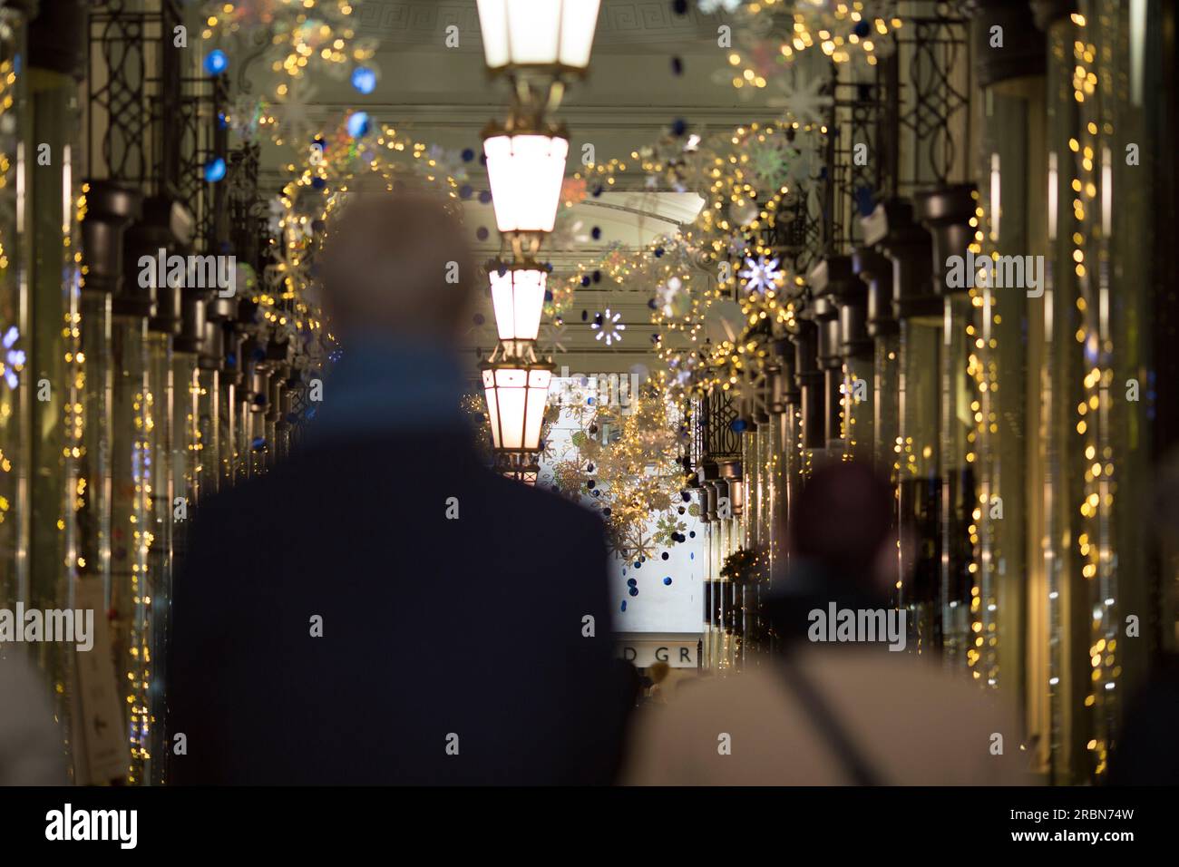 Shoppers walk in central London Stock Photo Alamy