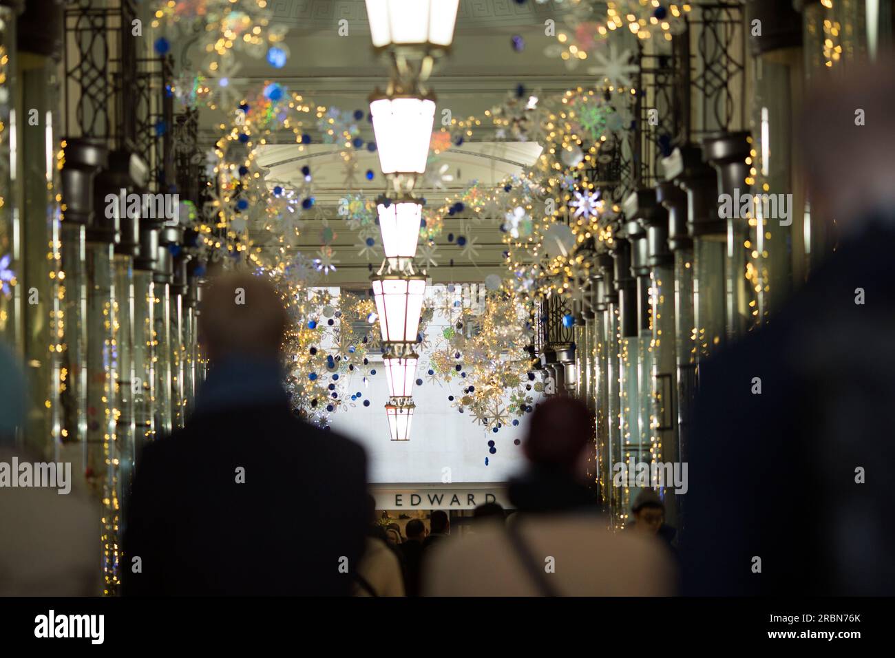 Shoppers walk in central London Stock Photo Alamy