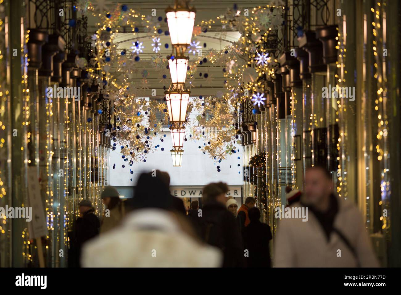 Shoppers walk in central London Stock Photo Alamy