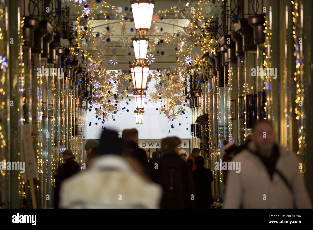 Shoppers walk in central London Stock Photo Alamy