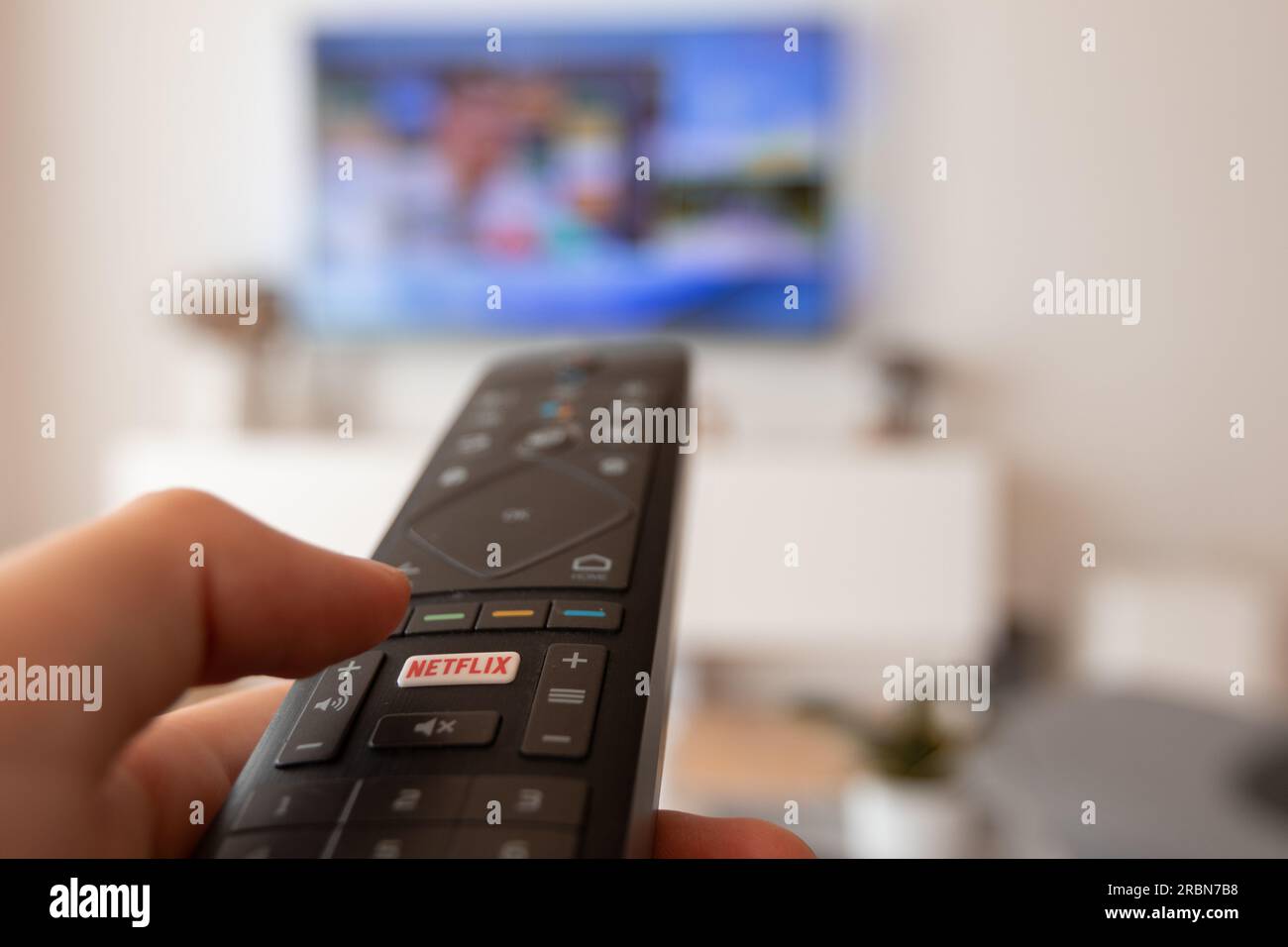 Hand holding remote smart tv hi-res stock photography and images - Page 2 -  Alamy