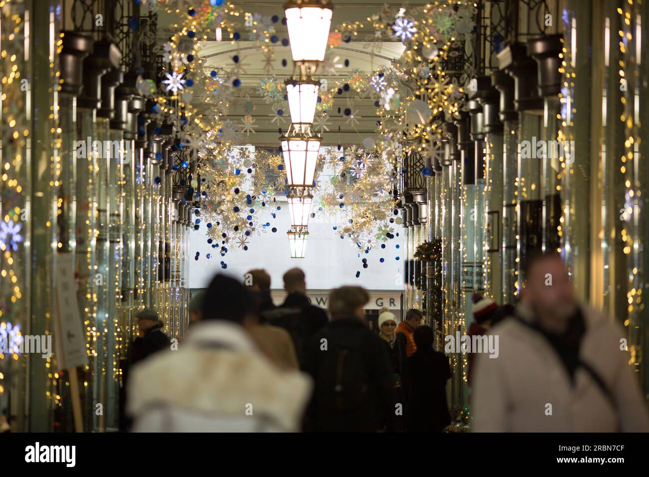 Shoppers walk in central London Stock Photo Alamy