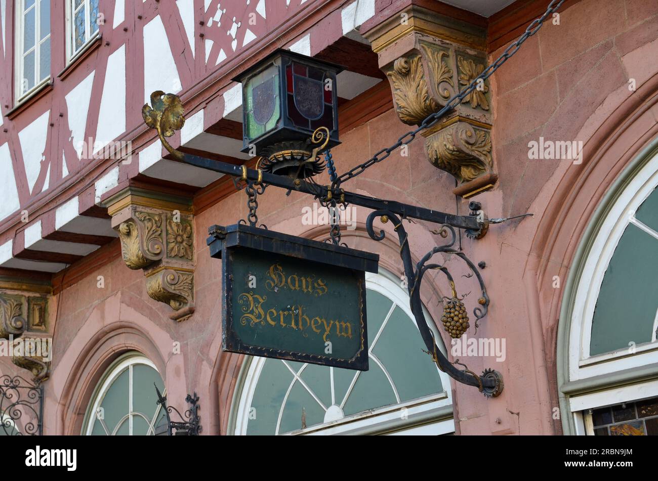 Frankfurt, Germany - February 24 2019: Old dark sign to 'Haus Bertheym' on decorated house wall of the old half-timbered house at Römerplatz in Frankf Stock Photo