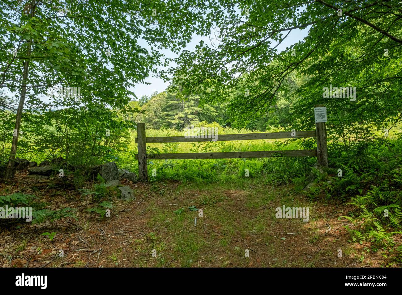 A gate to a farm's pasture in a rural New England town Stock Photo