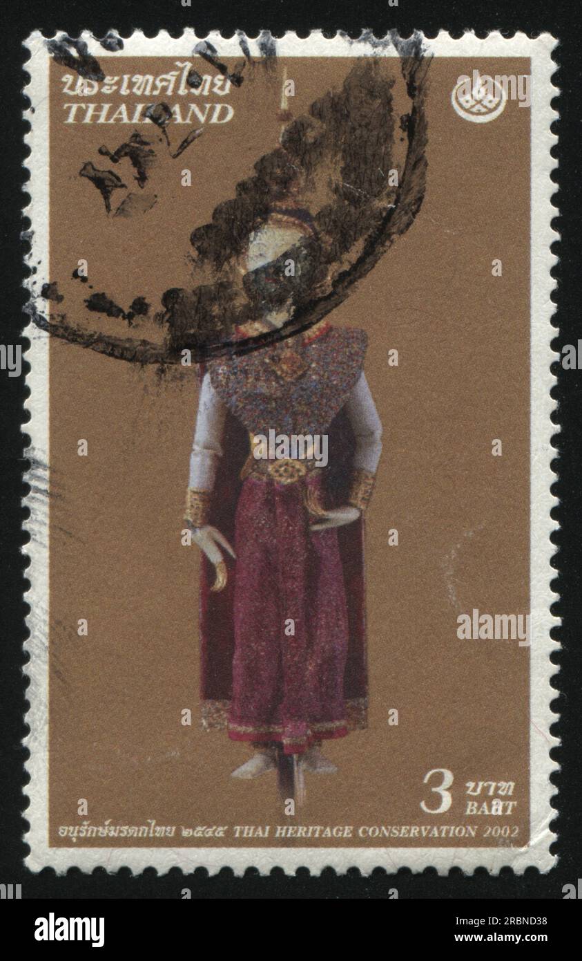 RUSSIA KALININGRAD, 31 MAY 2016: stamp printed by Thailand, shows a figure, thai heritage conservation, cirka 2002 Stock Photo