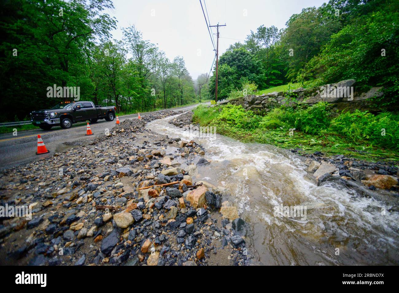 Heavy rain caused part of Route 30 in Jamaica, VT., to washout on