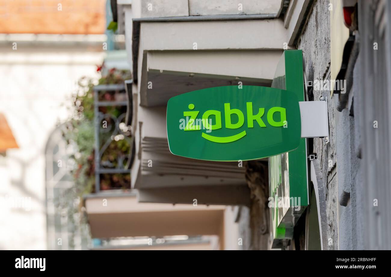 Poland, Zabka, popular Polish convenience store green signage logo sign