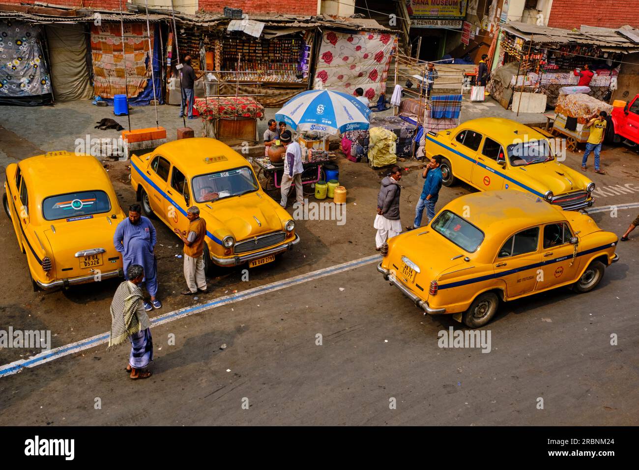 India, West Bengal, Kolkata, Calcutta, Yellow Ambassador taxis Stock Photo