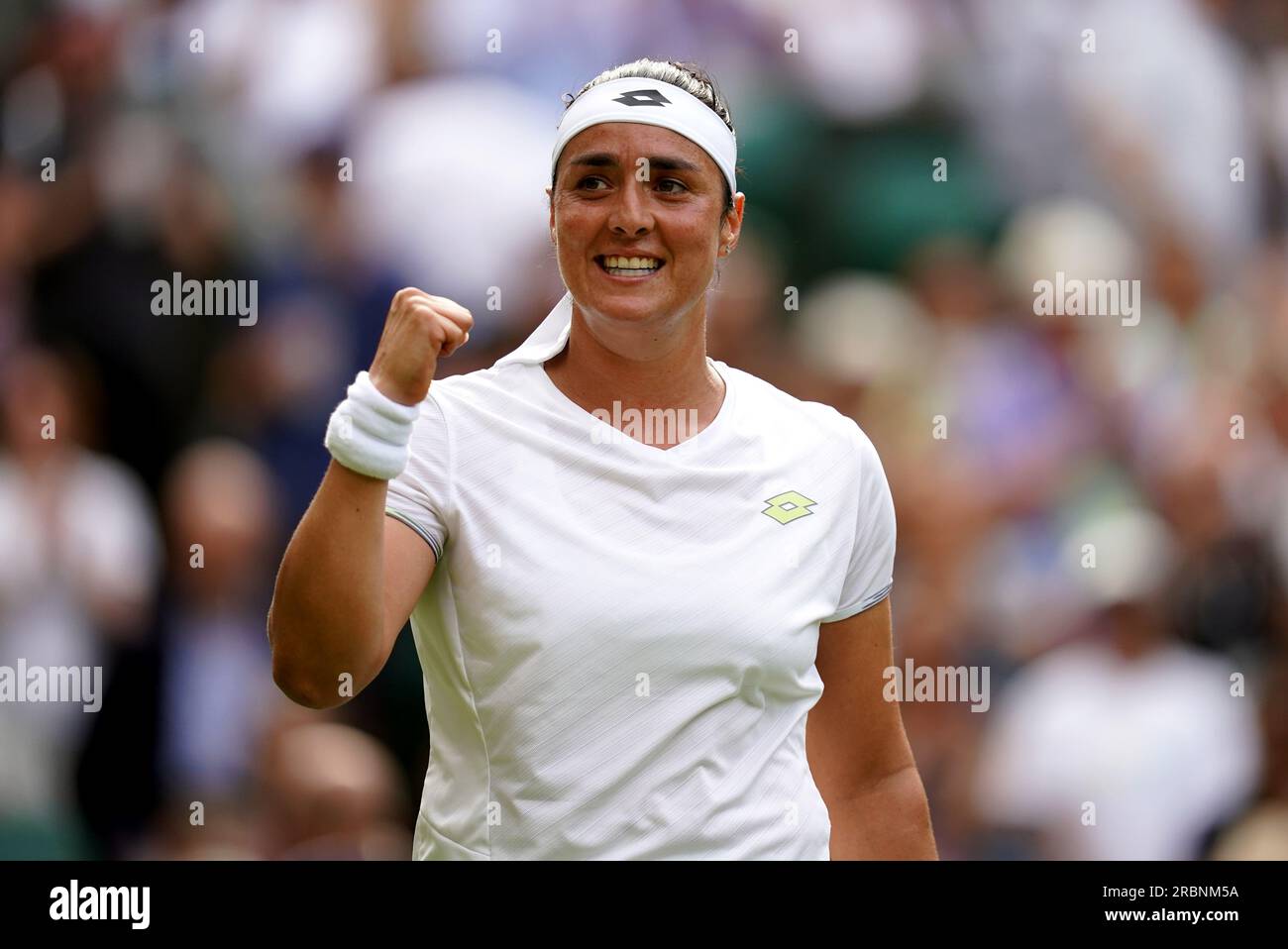 Ons Jabeur celebrates victory over Petra Kvitova on day eight of the