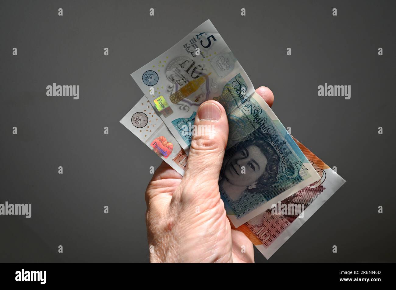 Pounds Sterling, five and ten pound notes. Stock Photo