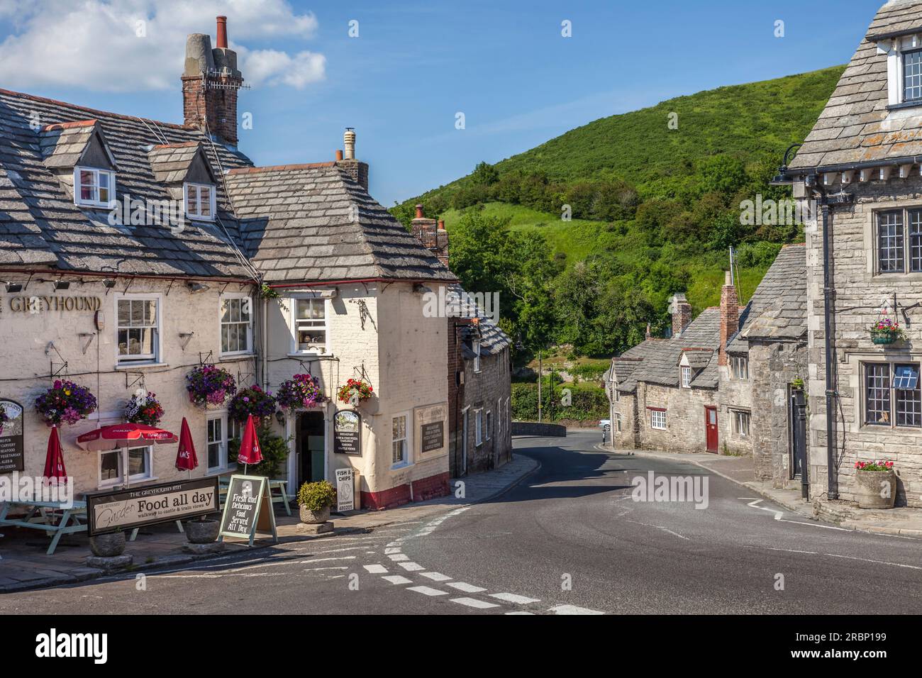 Village street in Corfe Castle, Dorset, England Stock Photo