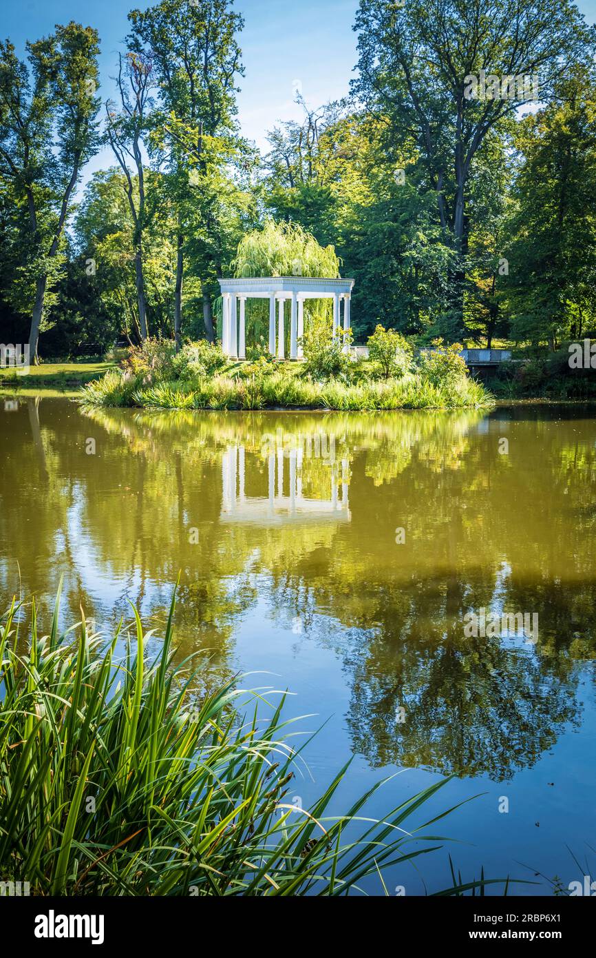 Pond with island and colonnades in Kleiner Tannenwald park in Bad Homburg vor der Hoehe, Taunus, Hesse, Germany Stock Photo