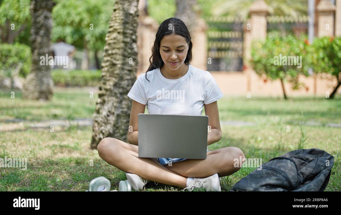 African american woman student using laptop studying at university ...