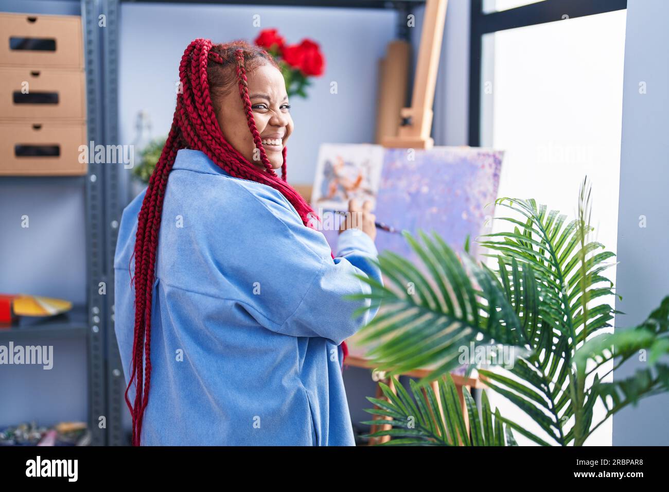African american woman artist smiling confident drawing at art studio ...