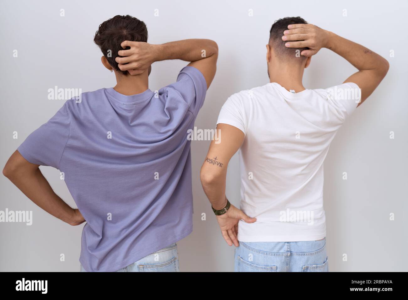 Homosexual Gay Couple Standing Over White Background Backwards Thinking About Doubt With Hand On 2238